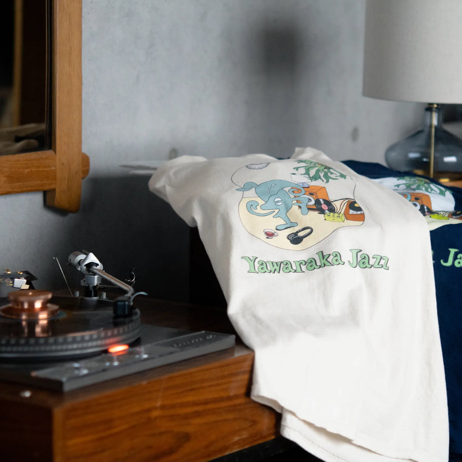 Room Tee in Ivory, draped over the turntable (photo shows the US-printed Room Tee)